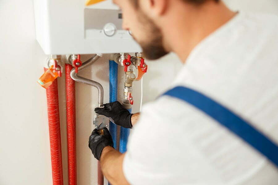 plumber checking pipes