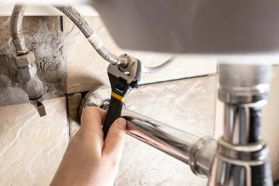 plumbing under a sink