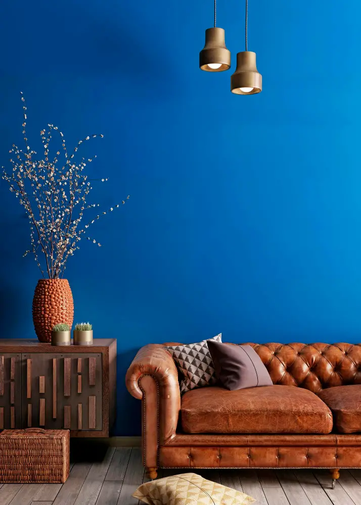 Caramel Couch with blue wall