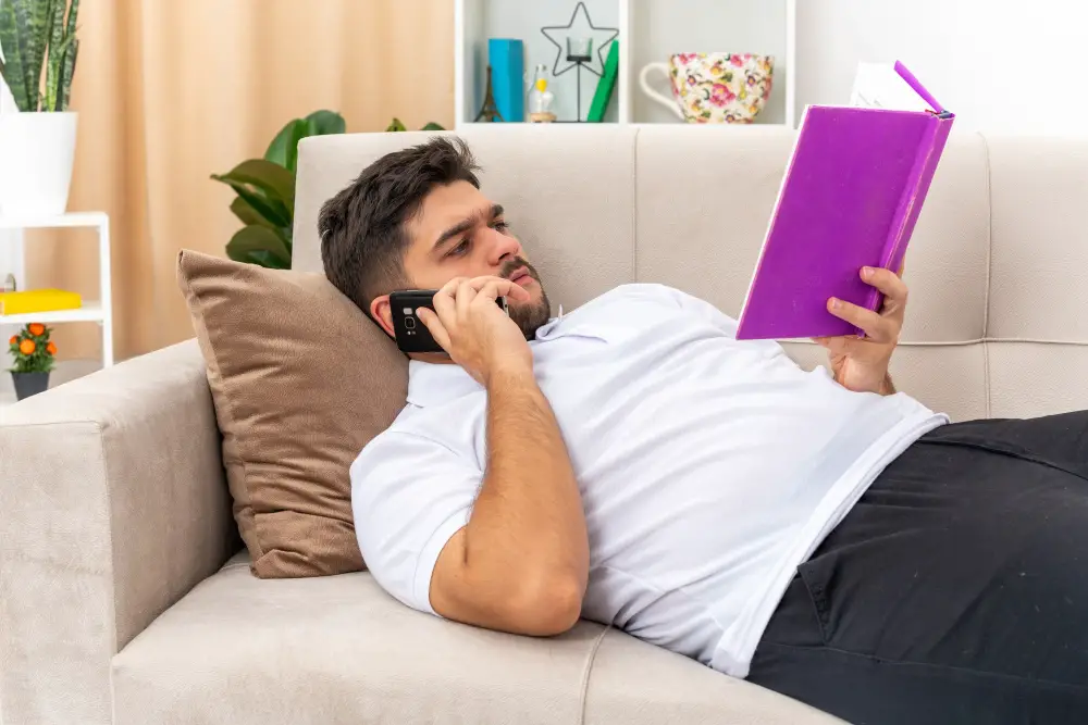 man slipping on Couch