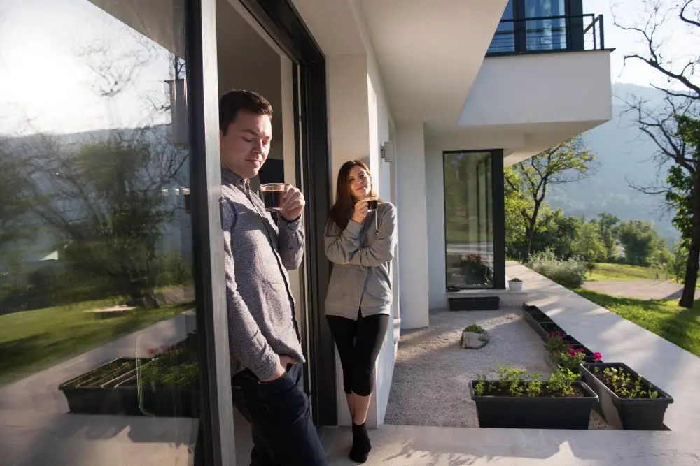 man standing in driveway at home