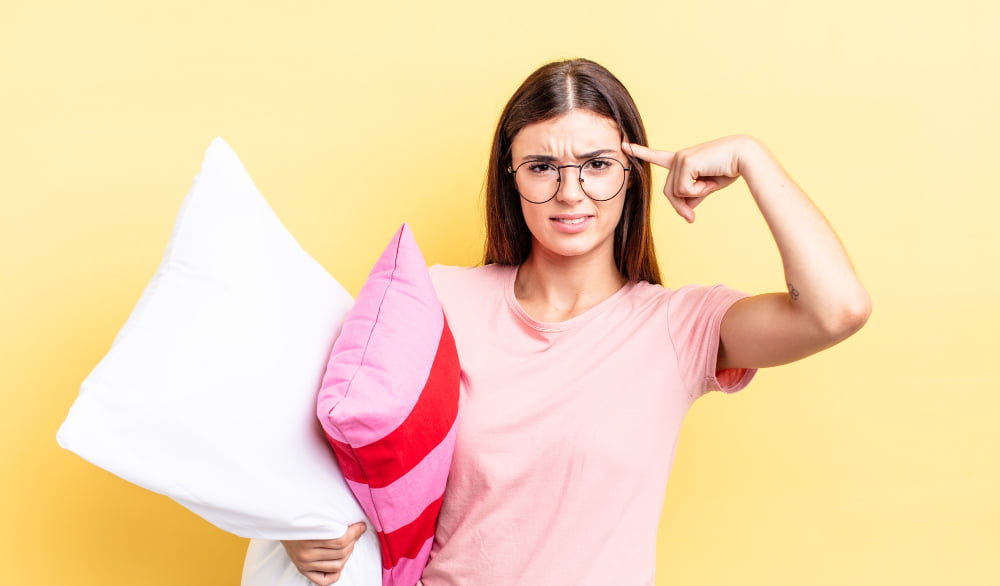 woman thinking to throw item or not