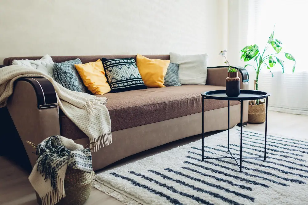 Mixing Textures Blankets on Brown Couch