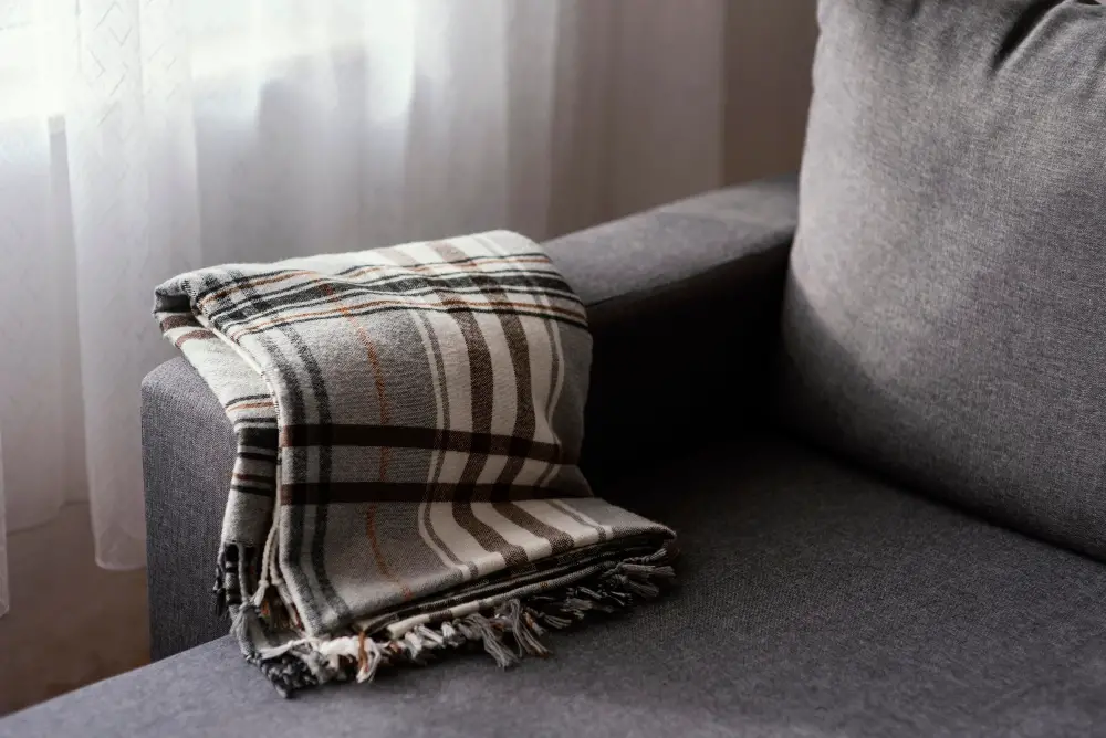The Tidy Corner Approach Throw Blanket Couch