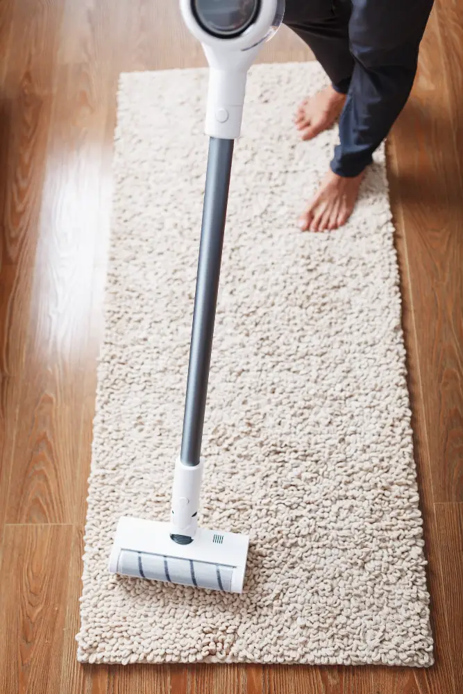 Vacuum Cleaning Rug Regularly 