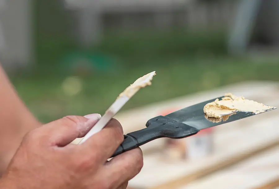 Putty Knife with Filler For Couch