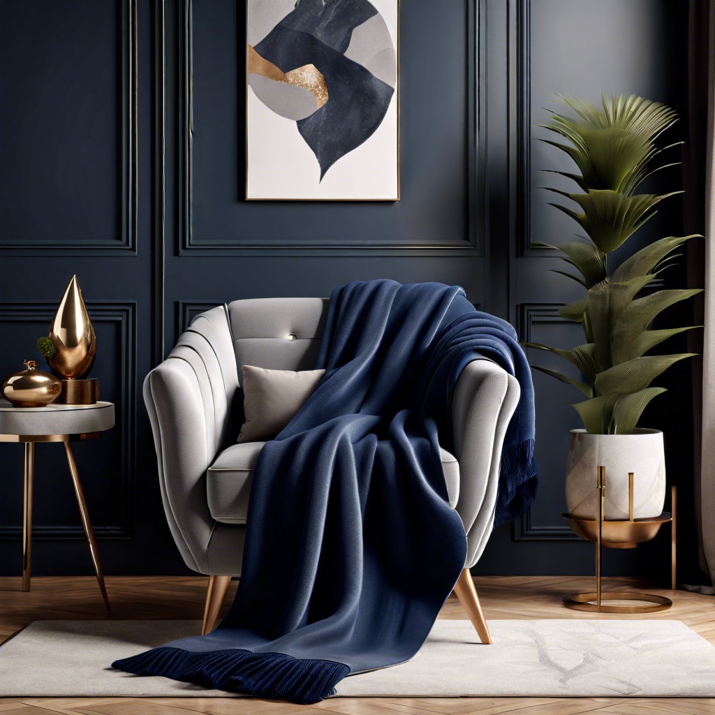 grey armchair with navy blue throw blanket